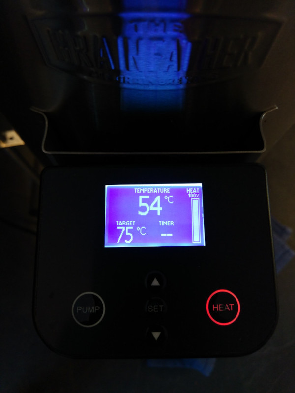 The Grainfather blue LED panel displaying current temperature whilst it heats the strike water