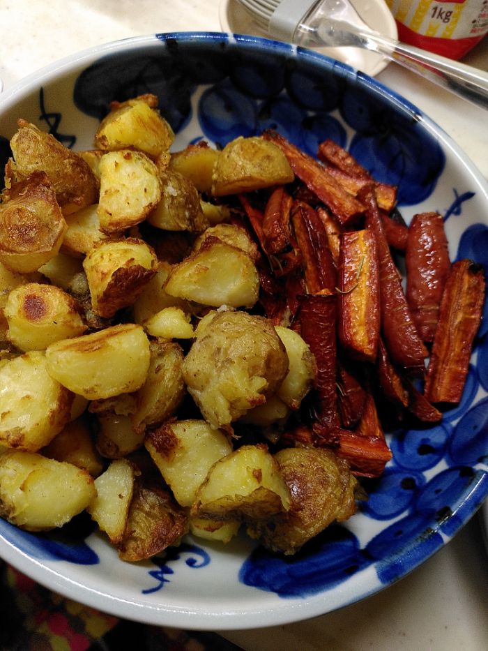 roasted potatoes and red carrots I'm a dish