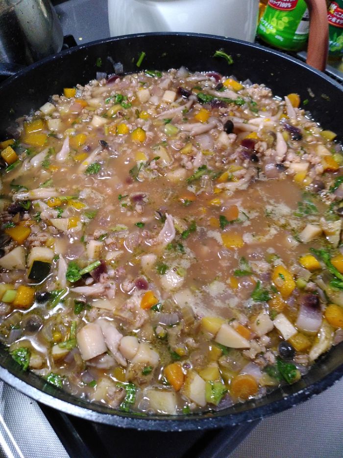 a bubbling barley stew in a big pot