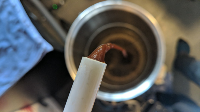 Photo of the stout being transferred to keg