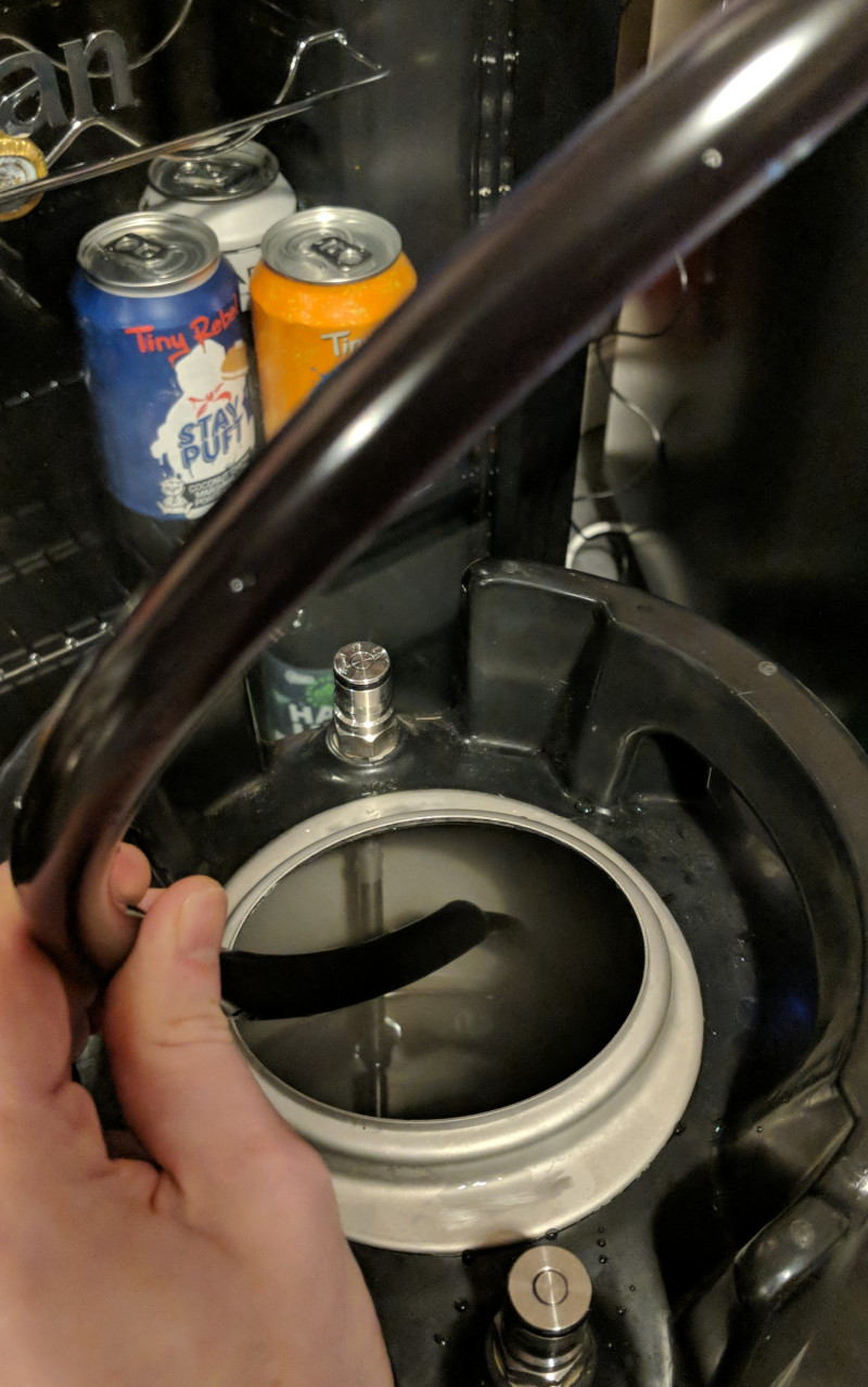 Photo of the stout being transferred to keg